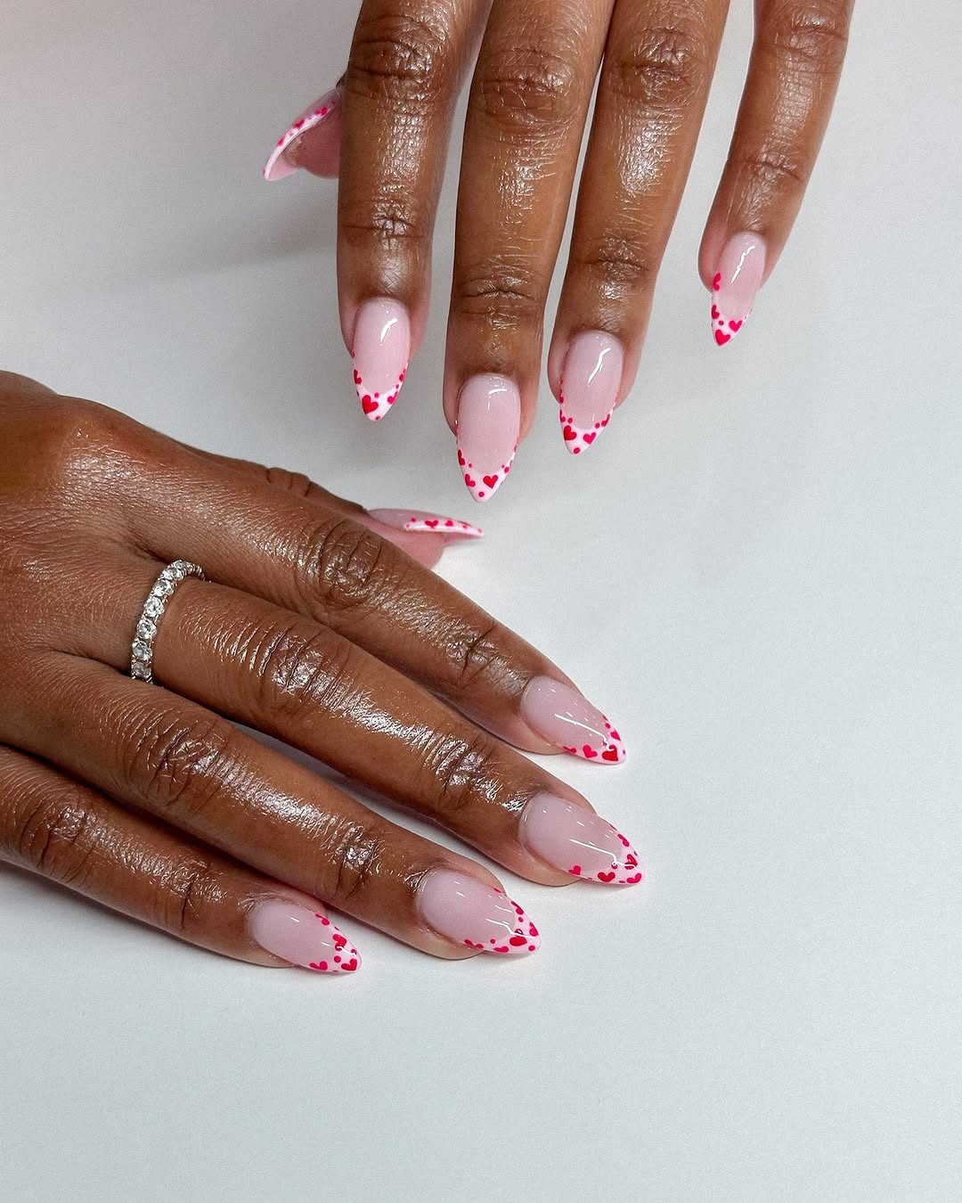 Pink french tip nails closeup