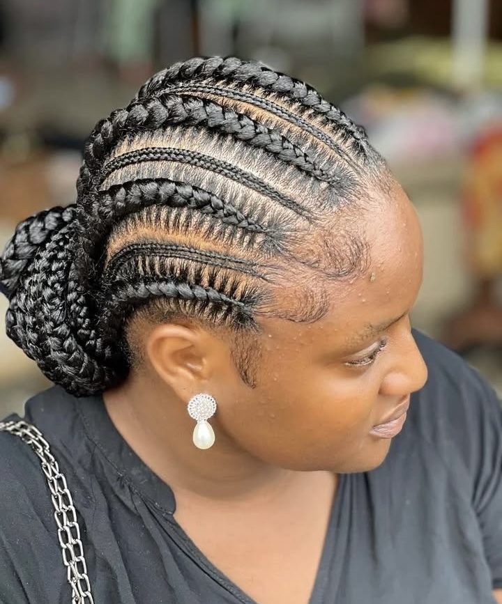Cornrow braids low bun side view