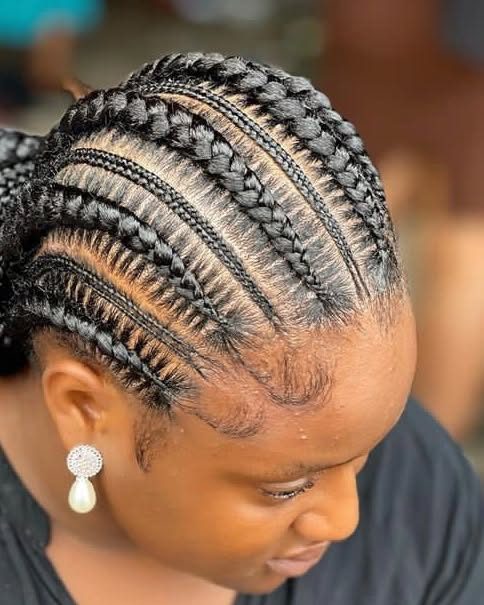 Cornrow braids low bun side view