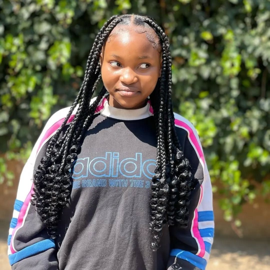 Long braids smiling portrait