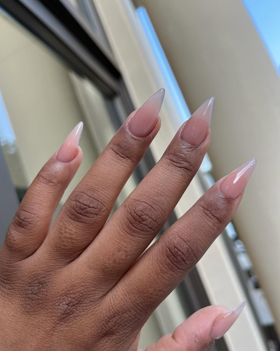 Long nude stiletto nails